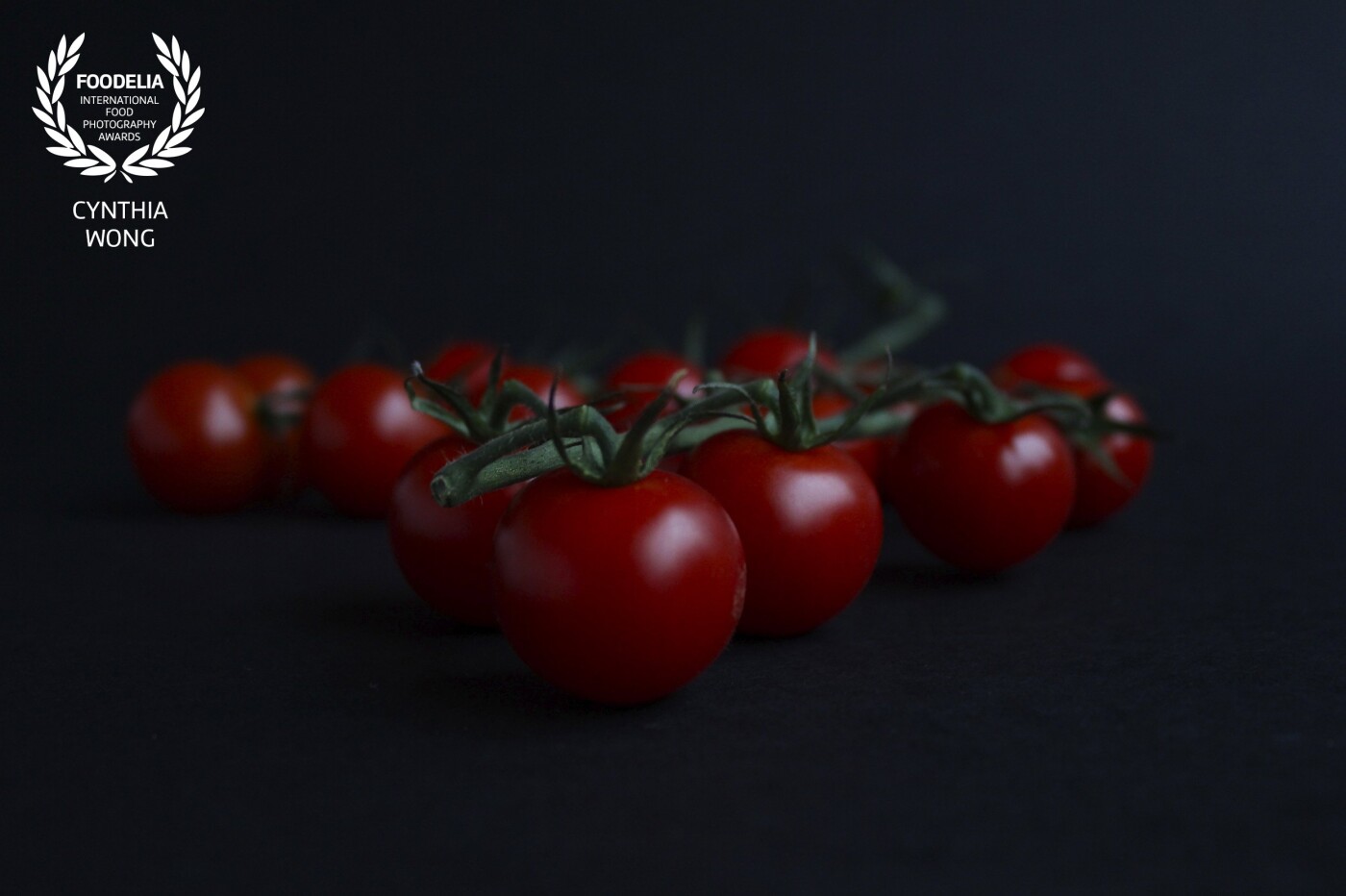 This is vine tomatoes taken in a dark/moody setting which I've been practicing a lot lately. Since the Food Photography & Styling course I did recently, I'm loving this style of photography more and more.