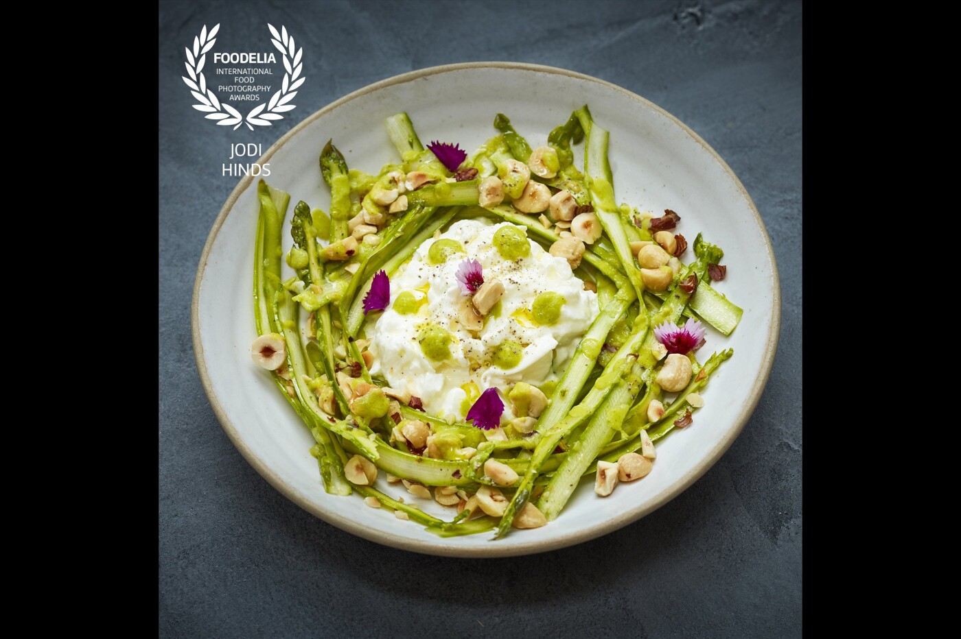Luscious burrata dish with shaved asparagus and hazelnuts<br />
Restaurant: @fucinalondon<br />
Campaign: @thisismission<br />
Production: @theforge.co<br />
Styling: @iaingrahamchef<br />
Photographer: @jodihindsphoto<br />
