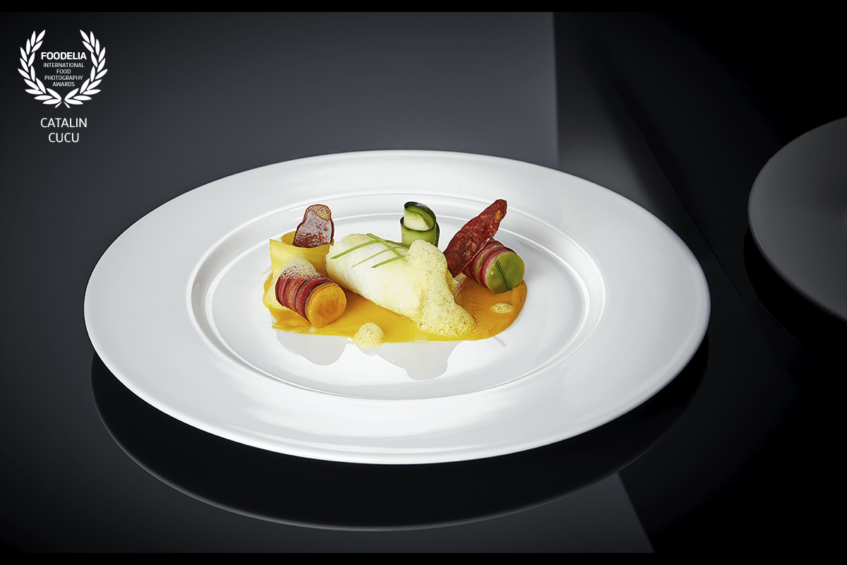 Poached Halibut | Chorizo chips | Domino vegetables | Safran Air.<br />
#bonjour_salzburg_photography<br />
Chef - Catalin Cucu<br />
I try to go away from the wood backdrops, Im sure there is something else out there!