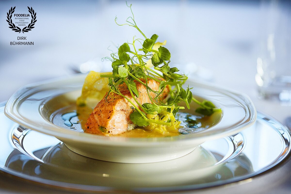 Steamed salmon with fresh herbs. The chef from the classy kitchen of "Naesseslottet" in Denmark created this dish for a wedding meal.