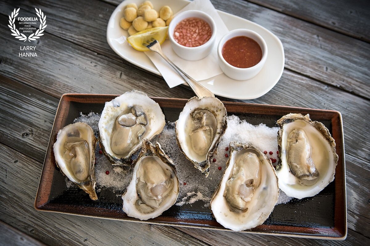 These oysters on the half shell were photographed for Top Catch Restaurant in Boston, MA.  Photographed on location overlooking the beautiful Boston waterfront.  Styled by Amy Villareale.