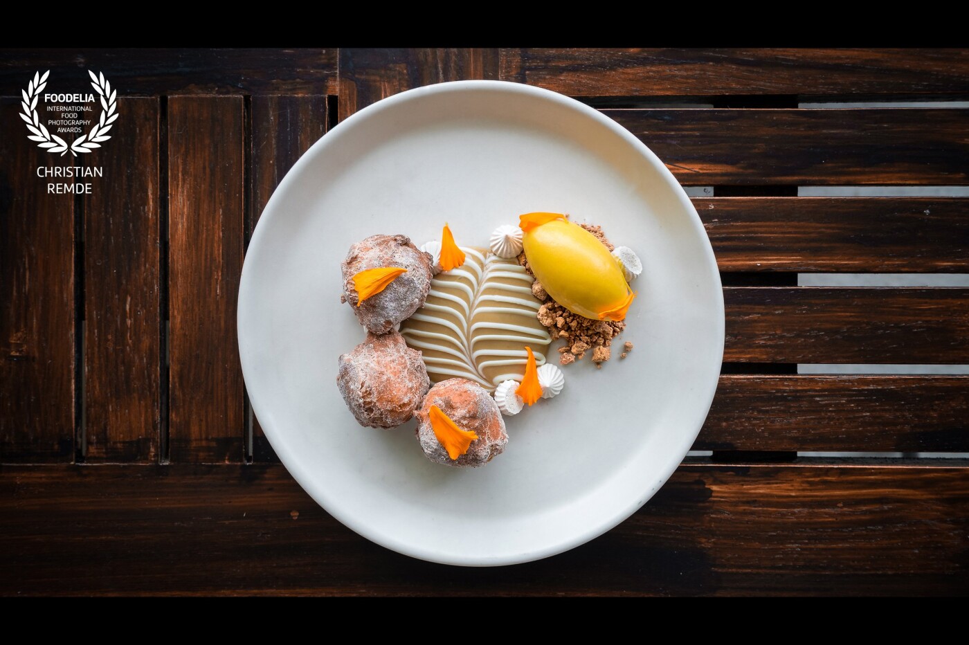 Donuts with espresso custard and butternut squash ice cream.  Taken at Barley Swine in Austin Texas, this dish was created by pastry chef Sarah Preito to celebrate how holidays spent baking with her grandmother helped to shape her love of food.