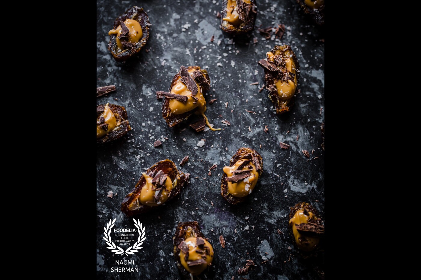 A quick and healthy snack of Medjool dates, natural peanut butter, dark chocolate shavings and a sprinkle of sea salt.<br />
Shot in my studio, with natural back lighting.<br />
