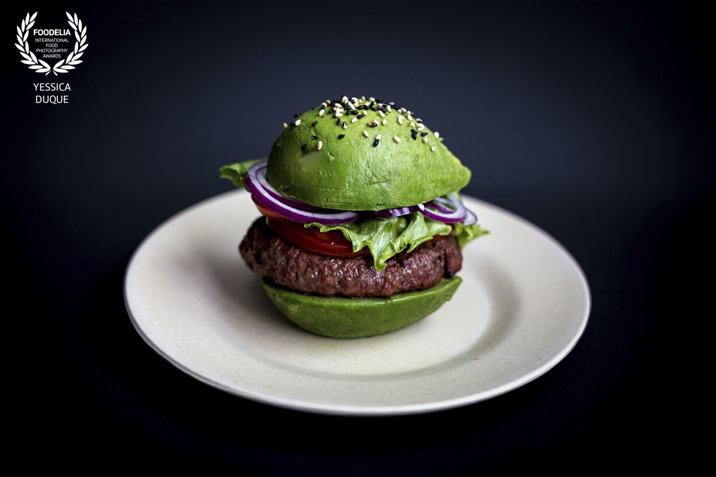 Angus Avocado Burger <br />
Best 2 ingredients in one dish!<br />
Camera: Canon 5D mark iii<br />
Lens: 50 mm <br />
Settings: ISO 400, 1/50 sec at ƒ/2.8, daylight