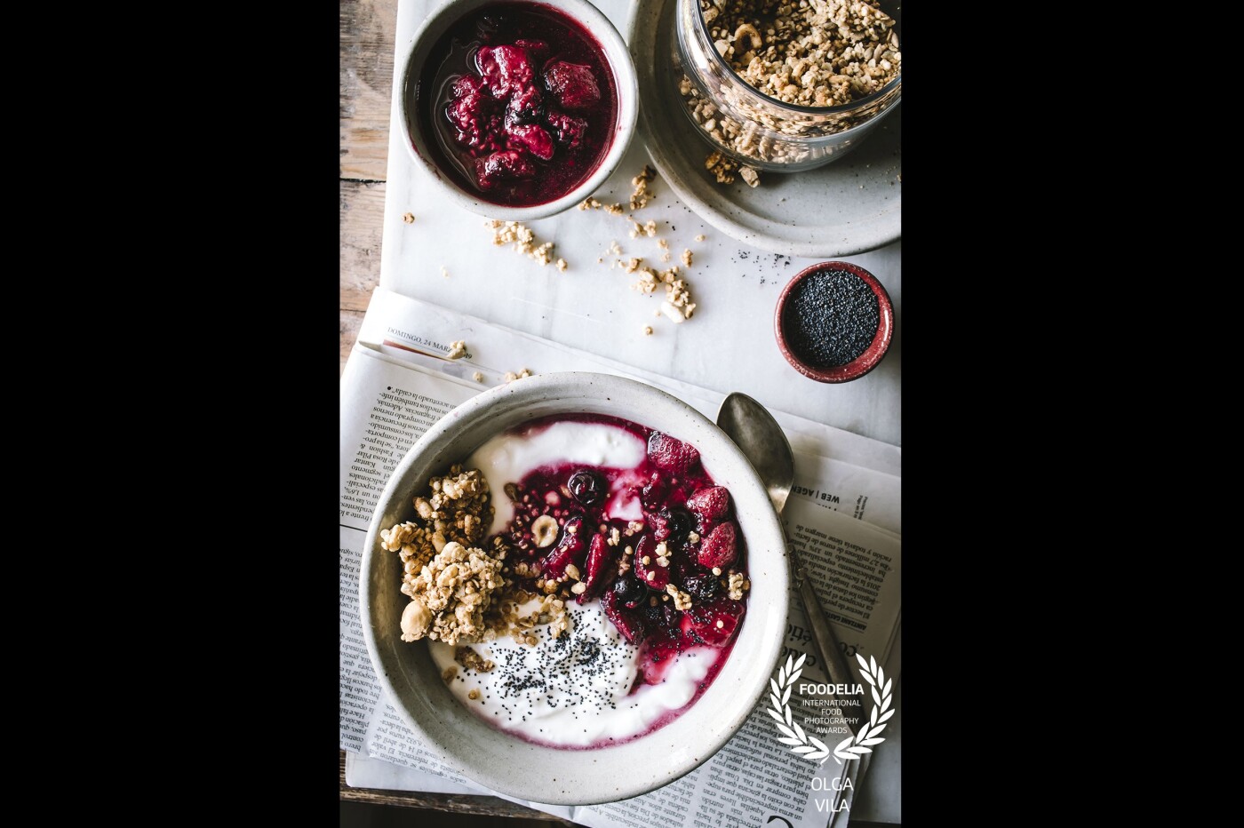 This is a new crunchy granola recipe , served with yoghurt and homemade berries compote. The shot is made with a Canon 80D, 24mm lens, ISO 320. 1/8 seconds,  f6,3