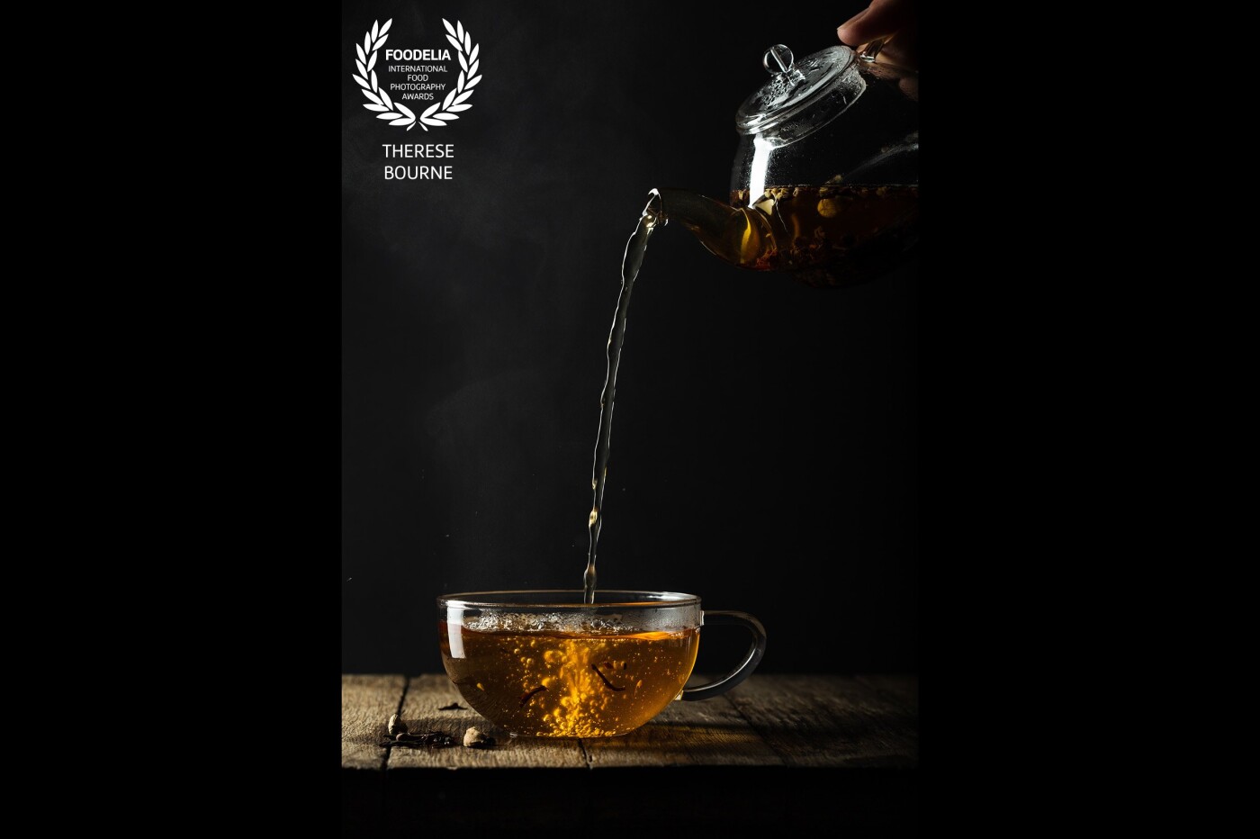 I've always been fascinated by the rituals of tea pouring all over the world and wanted to capture the 'almost spiritual' moment the light catches the golden liquid and the ethereal steam. It took over fifty attempts to get it just right!<br />
<br />
Canon EOS 1DX, 100mm macro f/2.8 USM, ISO 125, 1/250 sec, f/9.0