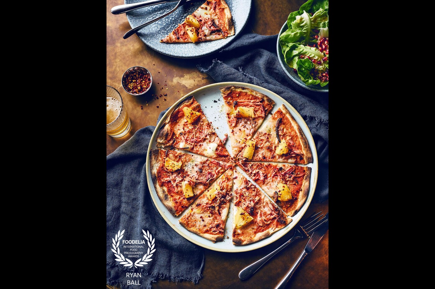 Posh Hawaiian Pizza - shot for Puttshack, Westfield, London.  Beautiful Romana base pizza with tangy cheese, chilli, ham and pineapple, so simple but tastes so good. <br />
<br />
