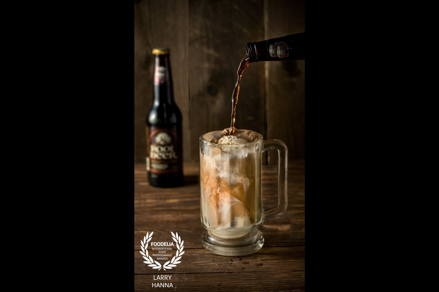 Who doesn't like a root beer float?  I created this photo for my own portfolio.  This image was created in my studio using short-duration flash to freeze the action.  The image was processed in Photoshop.