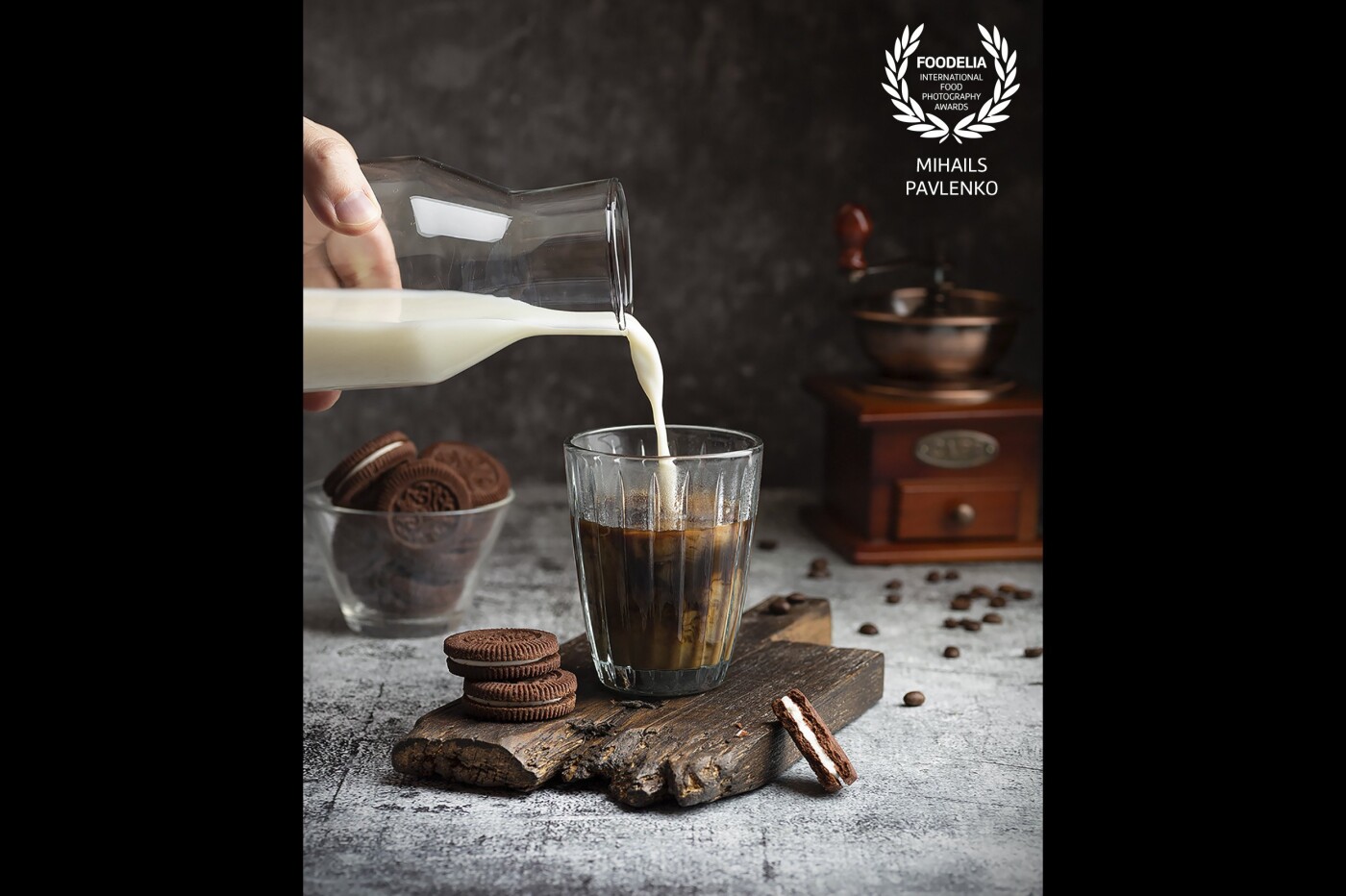 Preparation of tasty coffee drink. All that you need are well-roasted coffee beans, milk and some sweet cookies to extend satisfaction.<br />
