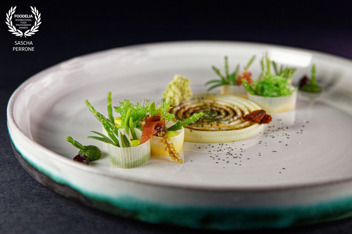 A creative dish from the "Flora" menu by chef Nils Henkel, one of the best chefs in Germany, which has been awarded two stars by the Michelin Guide in the Schwarzenstein restaurant. 