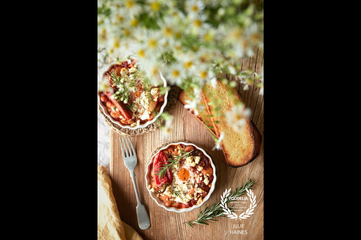 Baked eggs with homemade baked beans, a favorite homemade Sunday breakfast for our family. This image was shot with natural light. Canon 5D Mark IV and 50mm Sigma Art Series Lens.