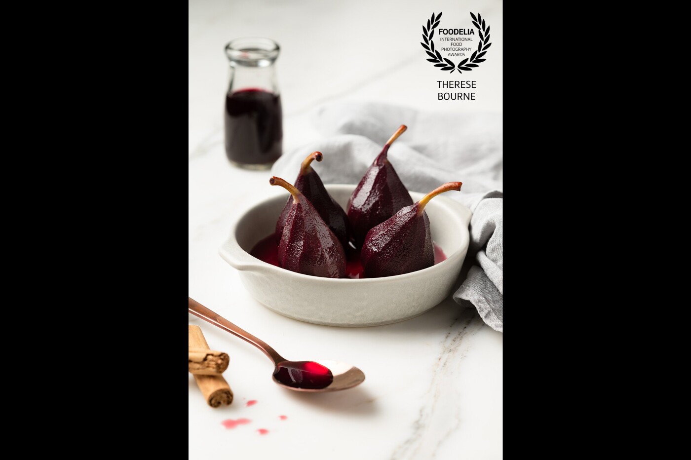 I shot these gorgeous poached pears for a magazine and it made the front cover. I love the intense color and the shine of the syrup against the bright neutral setting.