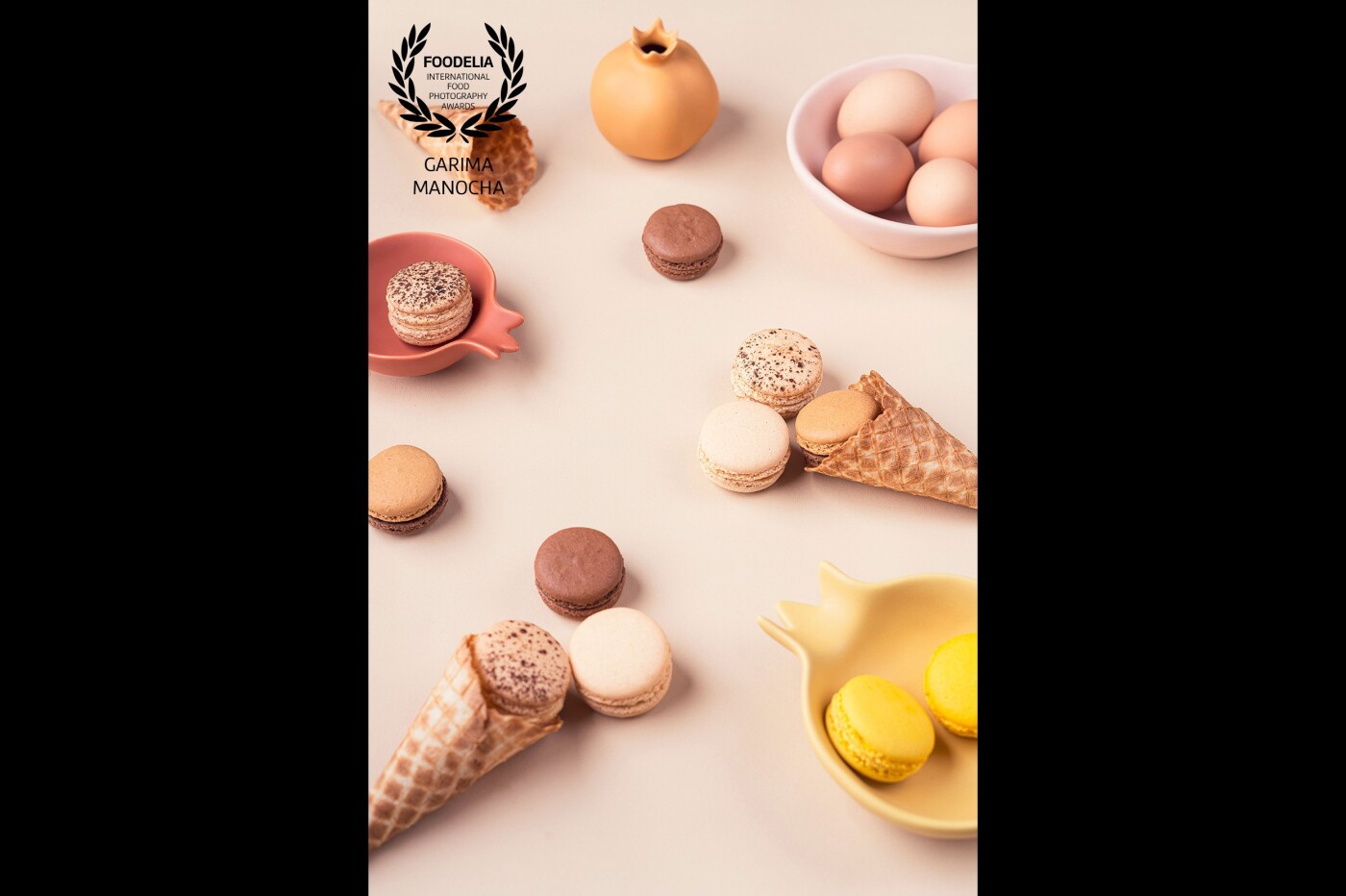 Some quirky macaroon goodness! <br />
An assortment of delicious macaroons shot and styled in pastel hues. A pop of yellow adds a certain fun element to the color palette and brings the shot to life. <br />
Shot using a single light with a parabolic softbox. 