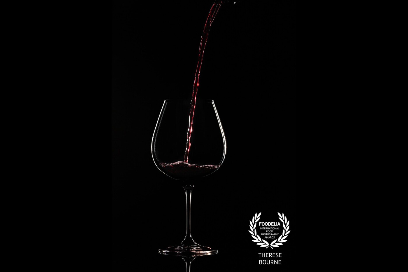 I created this image for a drinks photography challenge. I've always been fascinated by this type of lighting, and it was a real challenge working out how to light the different parts of the wine and the glass, whilst keeping the background dark.