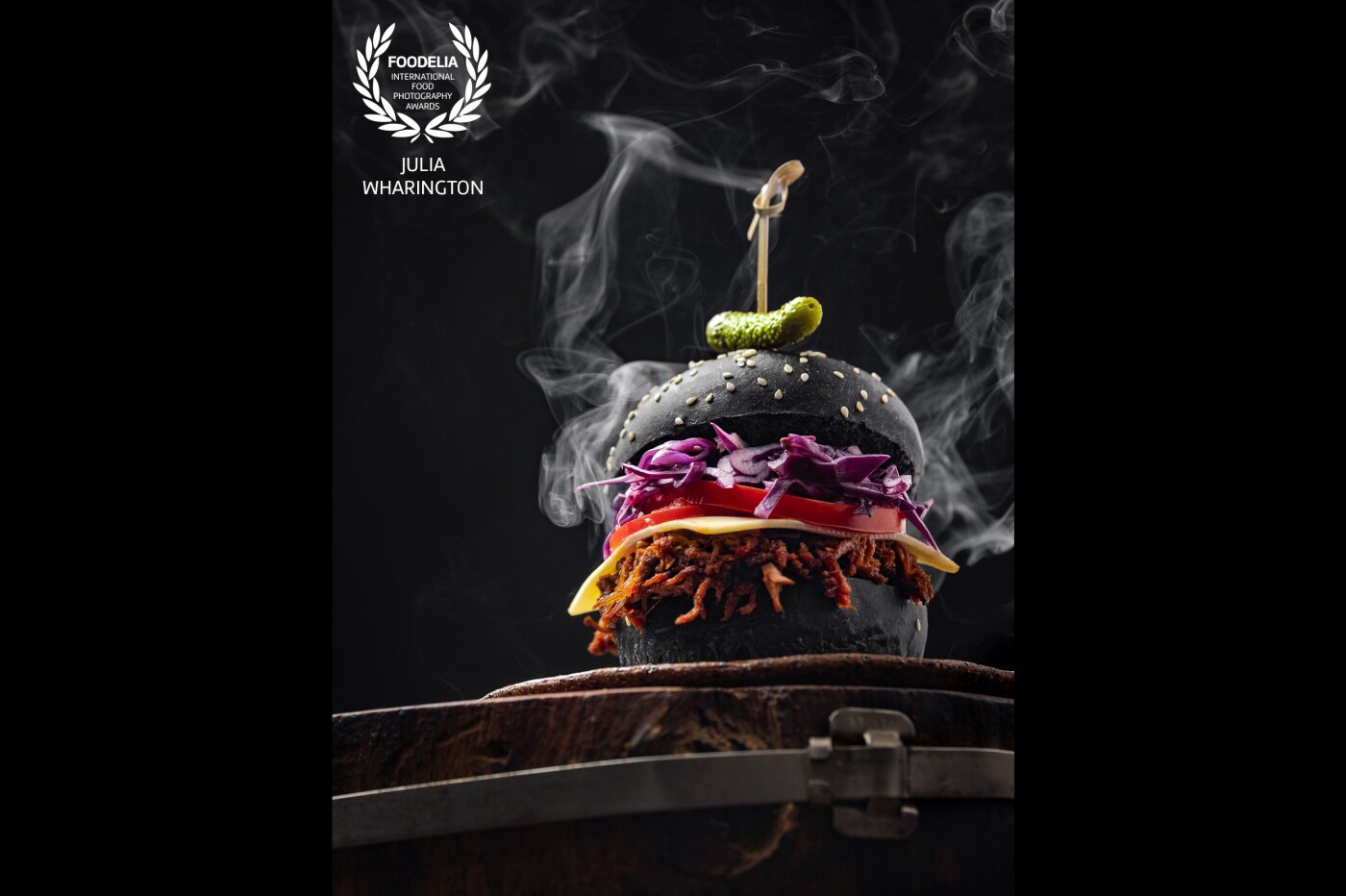 I think Lucifer would be happy to eat this smokin' brisket burger. This shot was inspired by those commercial bottle photography shots where the camera looks up at the subject. It really makes the product/food/subject look more powerful, don't you think?