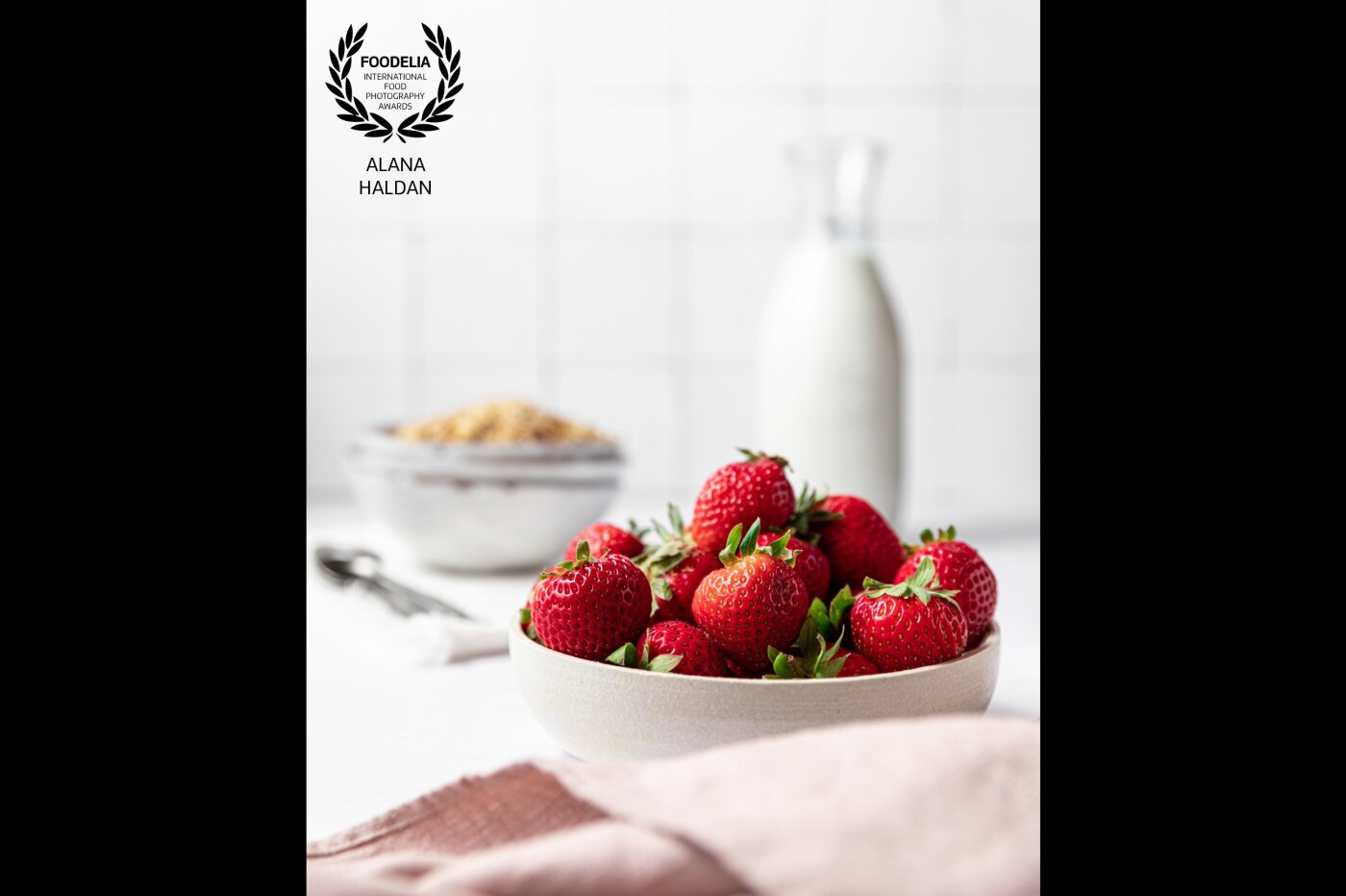 I shot this image for a strawberry-themed collaboration on Instagram. My goal was to create a light and airy look that would bring the focus to the bowl of strawberries and make the viewer feel like they getting a glimpse of my kitchen on a bright summer morning.