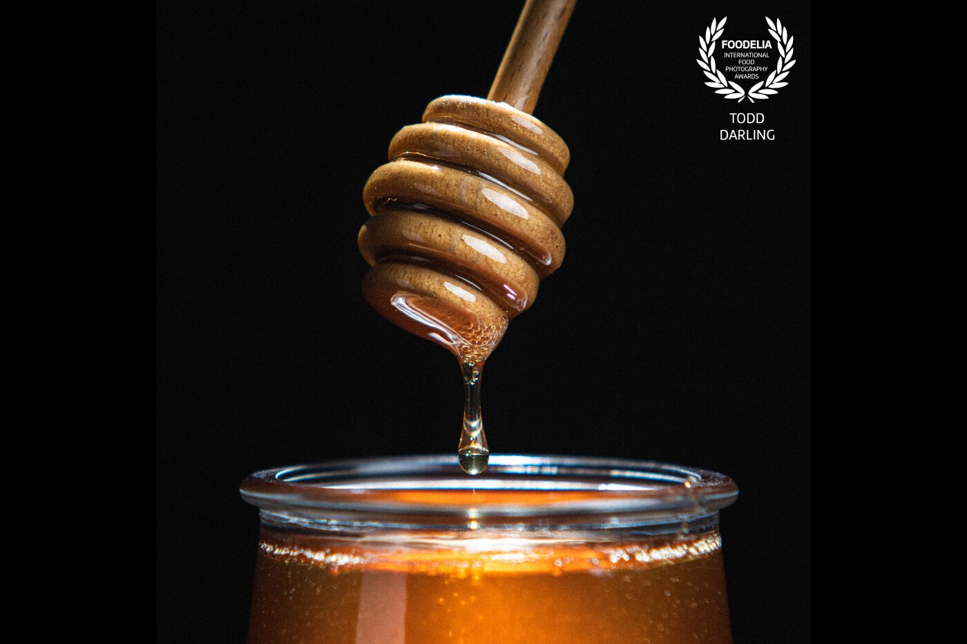 This was a study in lighting. I really wanted the honey to glow and feel rich and delicious. It took a few shots to catch the perfect drip of honey, and I really love how it came out. I love the highlights on the dipper and the rich golden color in the honey.