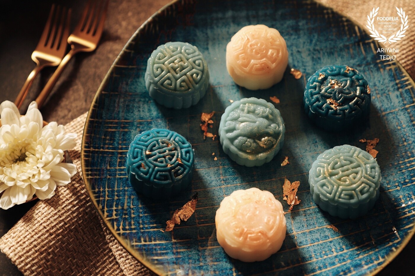 For the Mid-Autumn Festival this year, I decided to make my own mooncakes. One kind of mooncakes that I made is called snow skin mooncake as the skin is soft and slightly powdery. The skin is made of mochi dough and does not require any baking at all. For the paste fillings, I used durian purée in the blue mooncakes and custard in the white mooncake. The blue mooncakes used natural coloring from butterfly pea extract while the white ones are simply plain milk.
