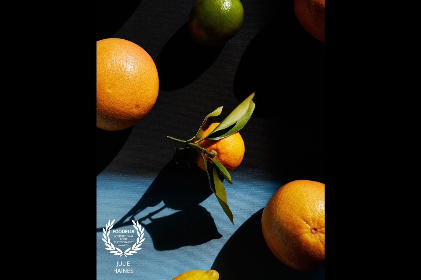 When your oranges look like they're in outer space - I love to capture hard light  - the dark shadows are mysterious and the shadow plays intriguing. 