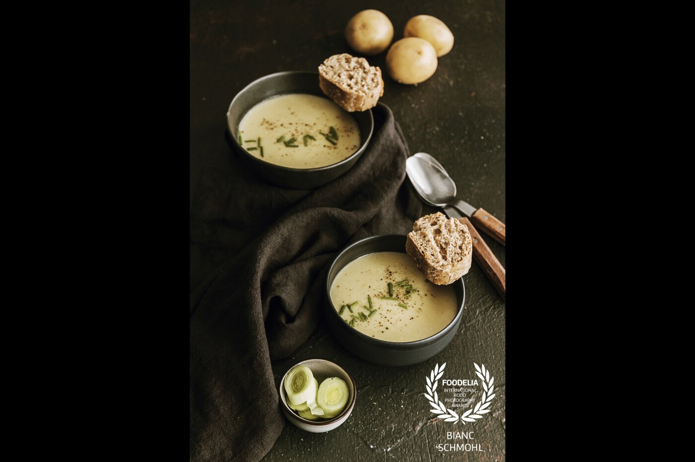 Potato soup with leek, onion, and chives. Great comfort food during the fall season and cold winters. I chose a semi-flatlay setup, which creates some nice spaces for decoration/styling. 