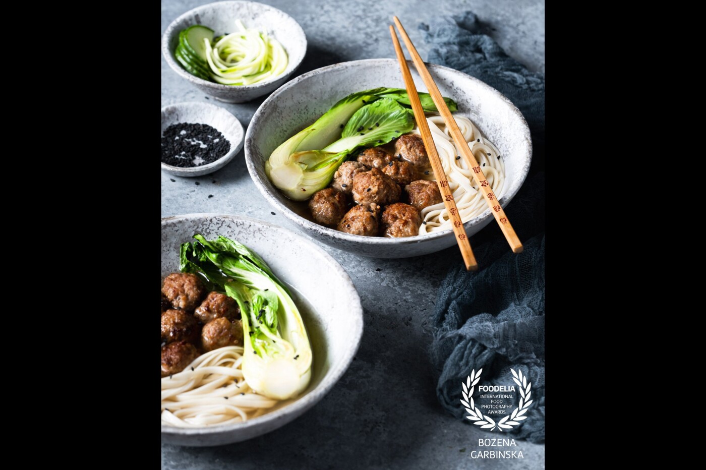 Meatballs with noodles and pak choi.<br />
Camera: Fuji X-T3<br />
Lens: Fujinon 80 mm<br />
Settings: ISO 320, 1/5 s, f/5.6<br />
Shot using artificial light.