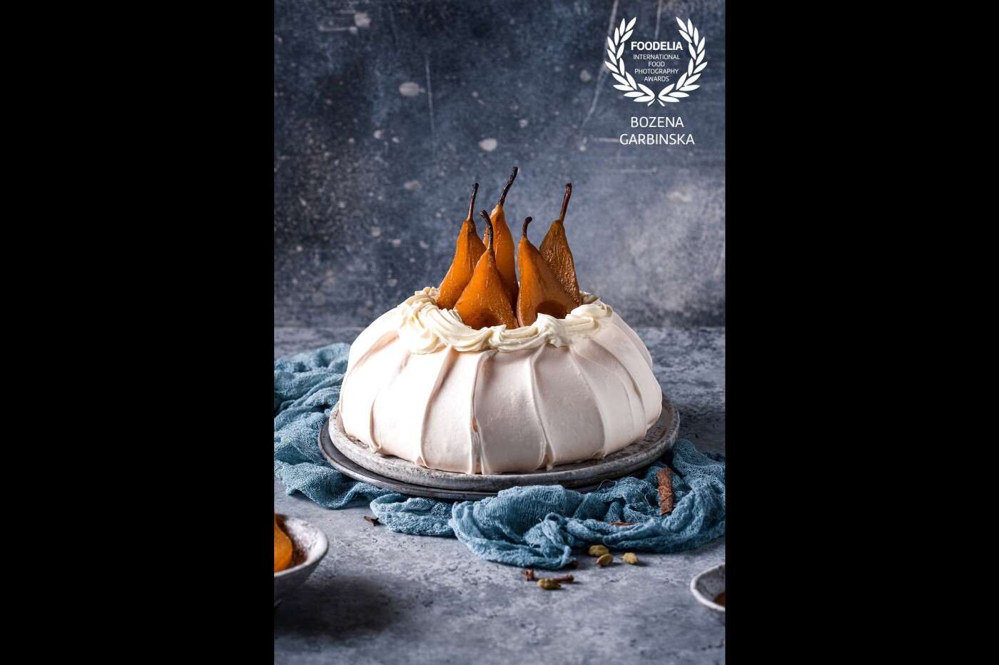Pavlova with pears in coffee and rum syrup<br />
Camera: Fuji X-T3<br />
Lens: Fujinon 80 mm macro<br />
Settings: ISO 160, 80 mm, 1/8 s, f/5.6<br />
Shot using artificial light