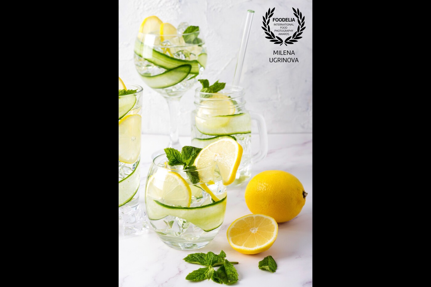 While dreaming for the hot summer, or just as a refreshment, get yourself a glass of G&T.<br />
I was going to a classic side lighting and simple background to accent the different type of glasses. The colours are limited to green and yellow for a fresh look and feel. I've chosen the front view to show the diversity of the glass heights and give the feeling of a depth. <br />
I hope my picture will make you thirsty ;)