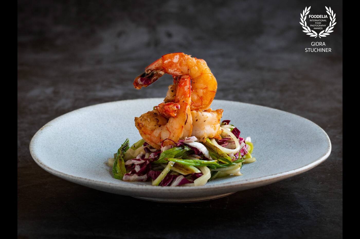 Shrimp and cucumber salad with grilled scallion, radicchio, and tarragon dressing by chef Anne Margret O'Hare of O Cuisine in NYC