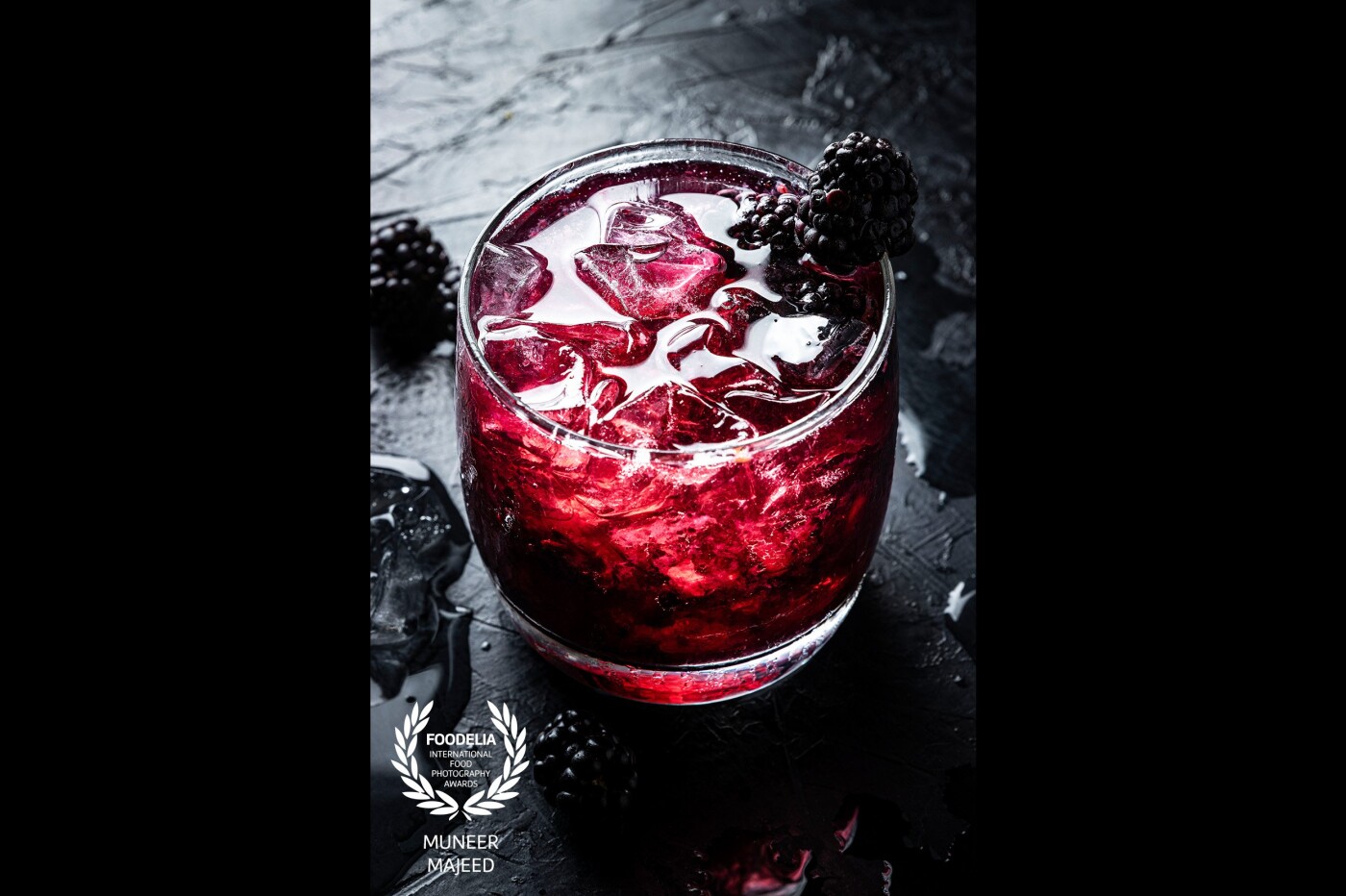 Drinks were never my favorite subject to photograph. So I decided to try one to see how well I could get it done.<br />
Whilst browsing through looking for inspiration I came upon some Redbull Mocktails. This image is my take on the BlackBerryBuzzerBeater made with the Redbull Blue Edition.