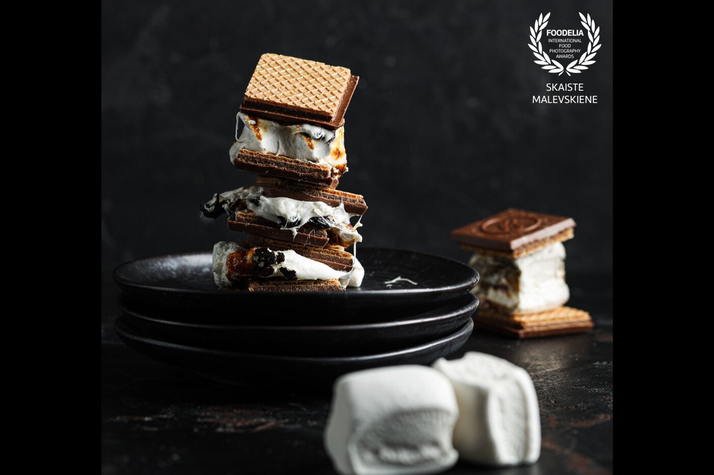 I was training how to photograph fire, smoke and ashes and therefore have flamed and caramelized  lots of marshmallows which consequently ended up in a beautiful dessert - S’mores. 