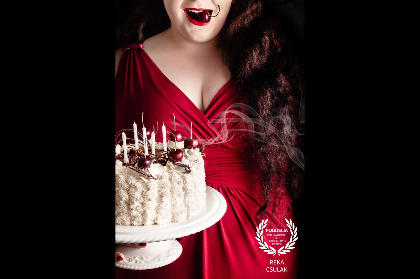 This capture is a playful self-portrait that pays tribute to the photographer's twenties on her birthday around Midsummer. Monochromatic, so it goes well to her style and full-on red as the cherry season was at its highest peak.
