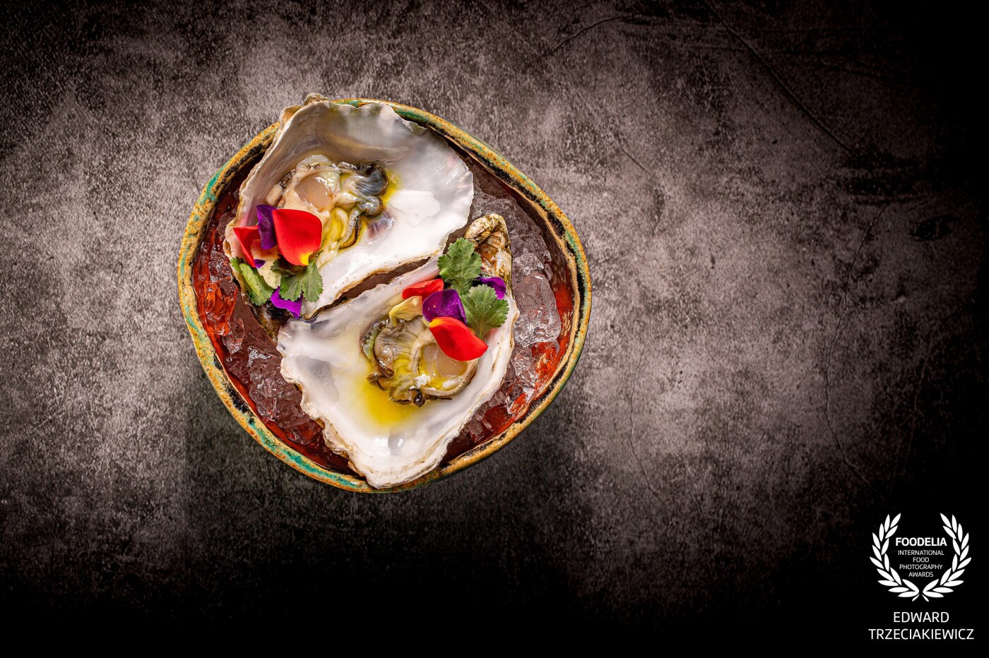 They are Irish Premier Oysters. High meat ratio and its sweet taste, crispy with a long aftertaste, typical from Irish oysters.<br />
We prepare these with yuzu and lime juice, herbs and flowers. Dish by Chef @rybusolsztyn / photo session in @kwasnejablko<br />
Canon 6D mark II ; CANON 100 Macro ; ISO 100 ; f 8.0 ; 1/160sec ; 2 two speedlights<br />
