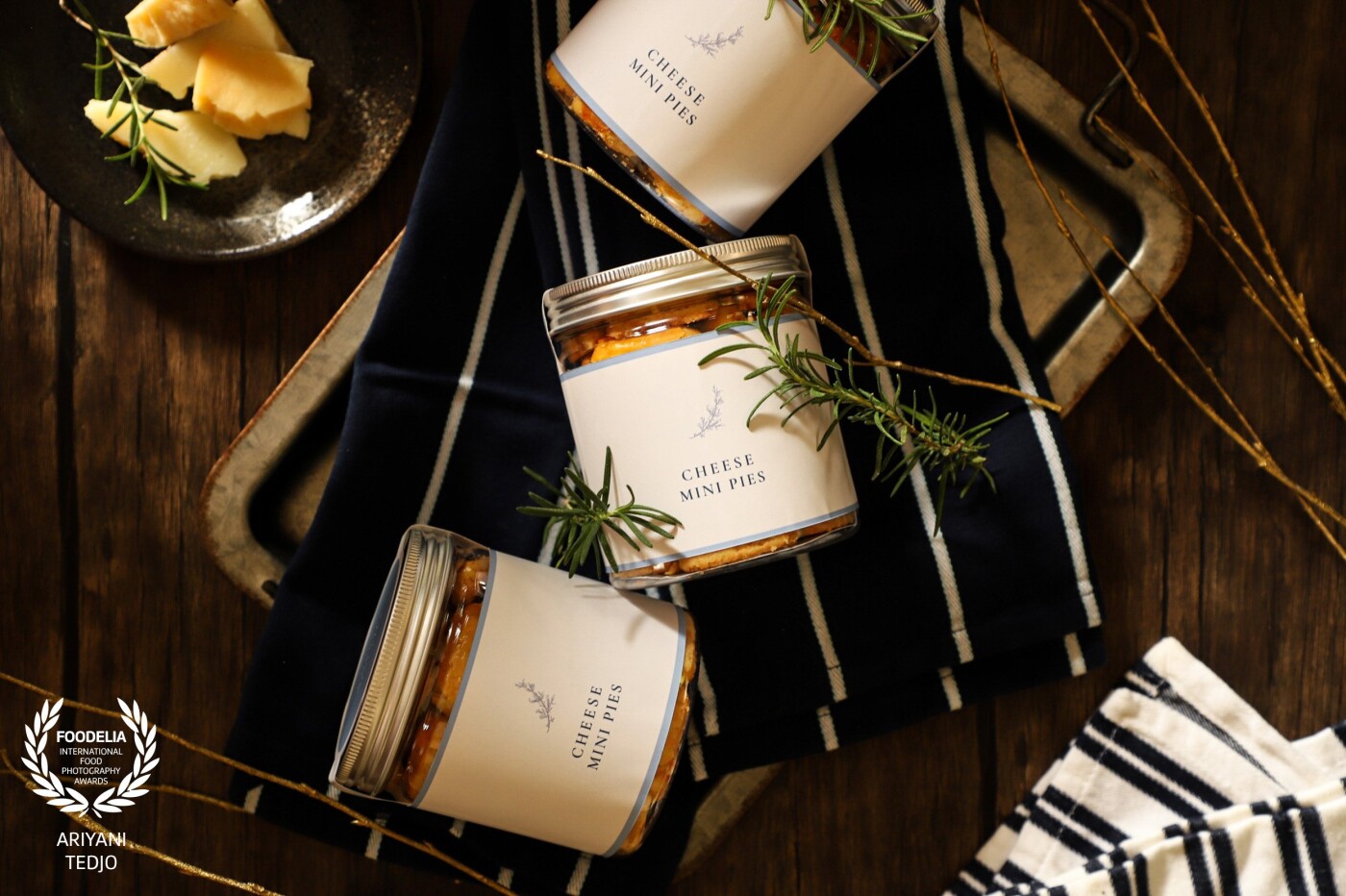 Three jars of cheese cookies. I made this shot for a Passover hampers from Truly Grace - Bespoke Gifts. The cookies are one of the delicacies one will get in the hampers. Since these particular hampers also targeted gentlemen as the recipient, I styled the scene with some masculine vibe.