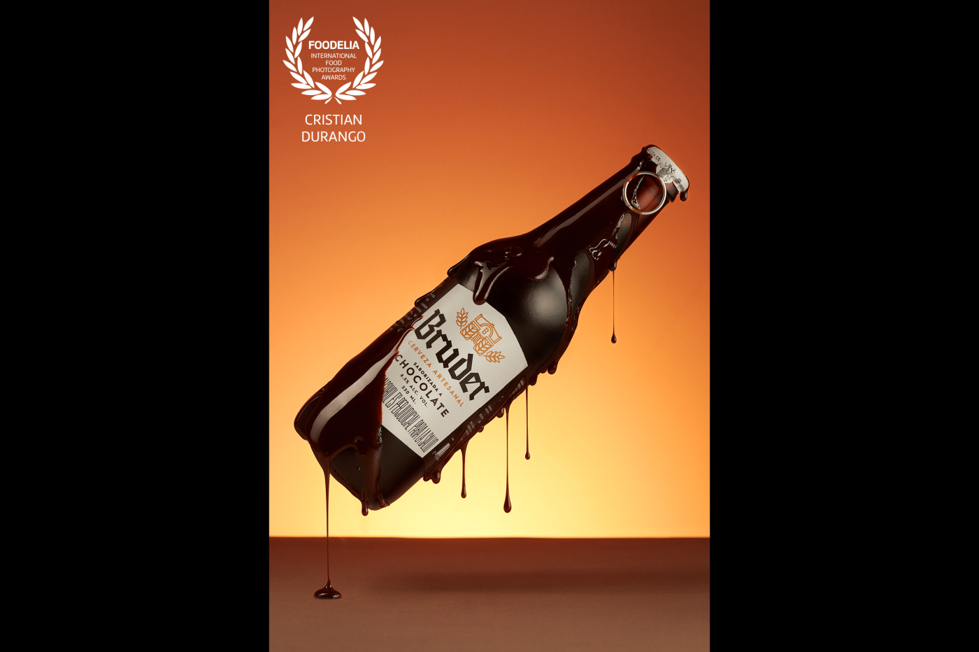The best way to enhance the flavor of a delicious beer is to show its nature, what it is really made of and what it makes you feel. I took this photograph with 3 lights, 2 on the sides and one in the background. Obviously, I did photoshop just to put together several shots of the chocolate.