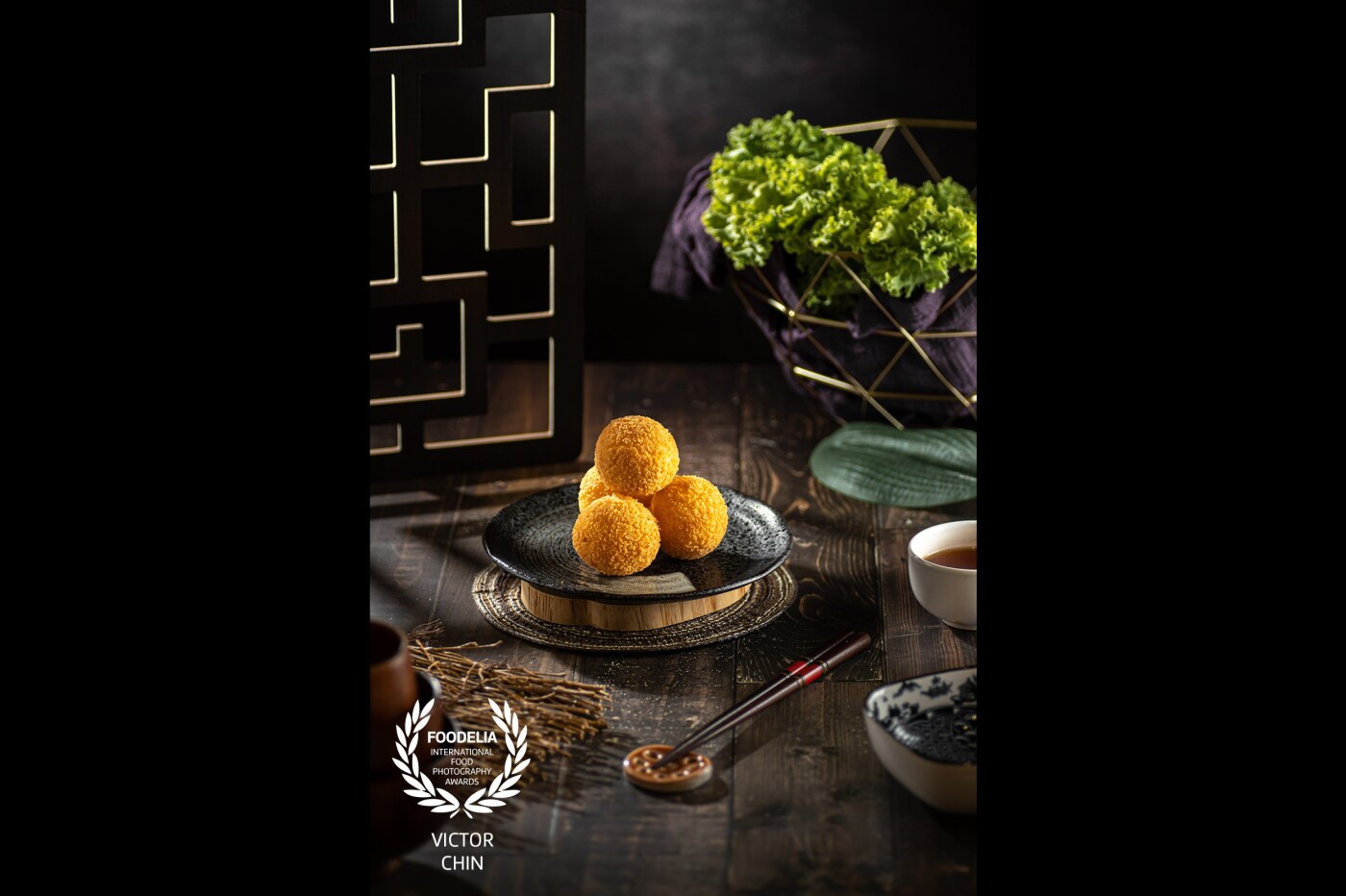 Golden Sesame Ball. Shot this with styling for poster and packaging usages. 3 lights have been used to create this art. Making the golden ball pops.