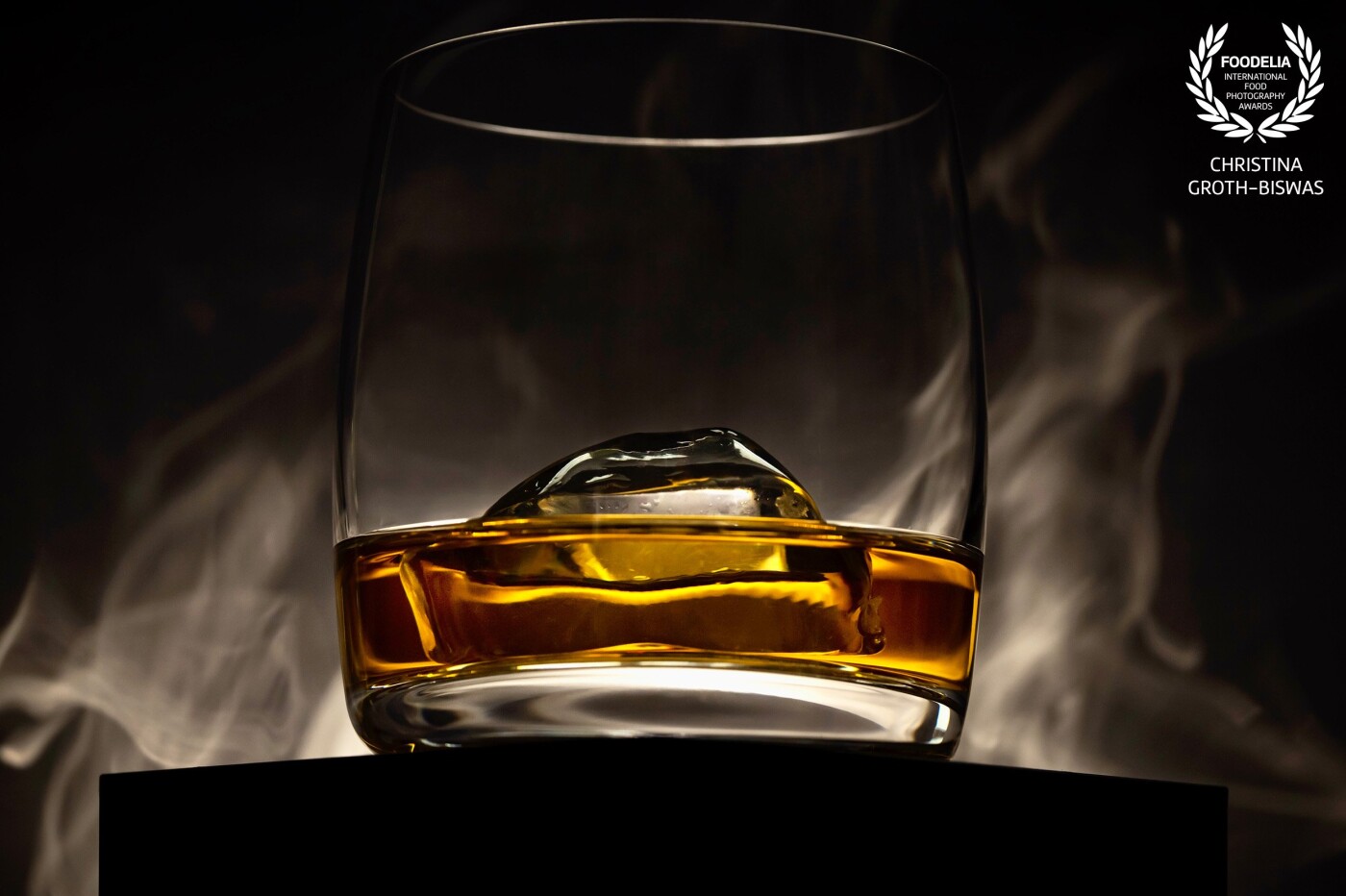 Scotch on the rocks. I was playing with light and smoke here. Since it was a little too early in the day to actually drink it,  it wasn’t wasted but used to deglaze a pan while making a delicious cassoulet de canard.