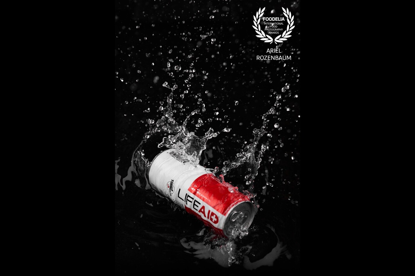This was a spec shoot for LifeAid, throwing cans into a shallow black tub with water. Their marketing was mostly bright and white and I wanted to see about providing a different look that was still desireable and refreshing.