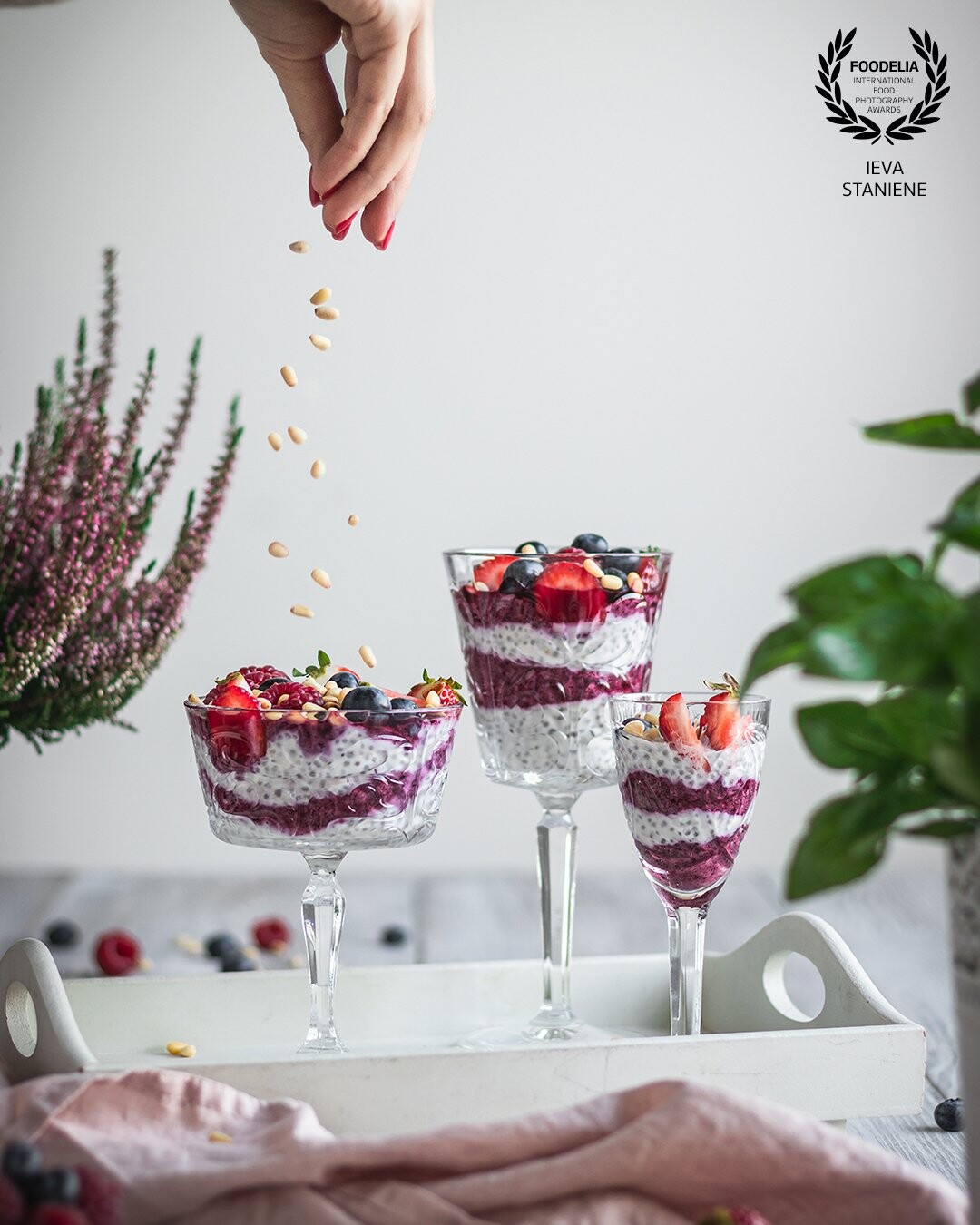 Breakfast or a dessert? This yogurt chia pudding with berries can surely be both. And it's easy to make it with frozen berries during colder months too. <br />
<br />
I wanted to capture movement sharply here to attract the attention to all those pine nuts, which gave texture and interesting taste to the dish.