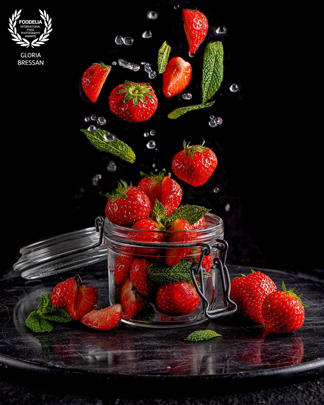 ...Are these strawberries coming out or are they going into the pot? :-)<br />
Taking this pic with real drops of water blown from under the table was the hardest thing !