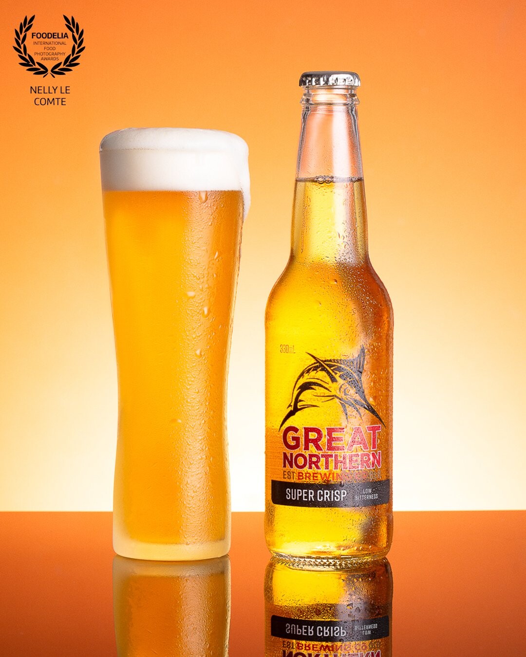 Studio photography test shot the day before a full day food and beer photo shoot with chef and stylist. I wanted to get the colour of the beer right and happened to have a bottle of Great Northern, a local beer in the fridge. Then enhanced the golden beer tones with the orange backlight.