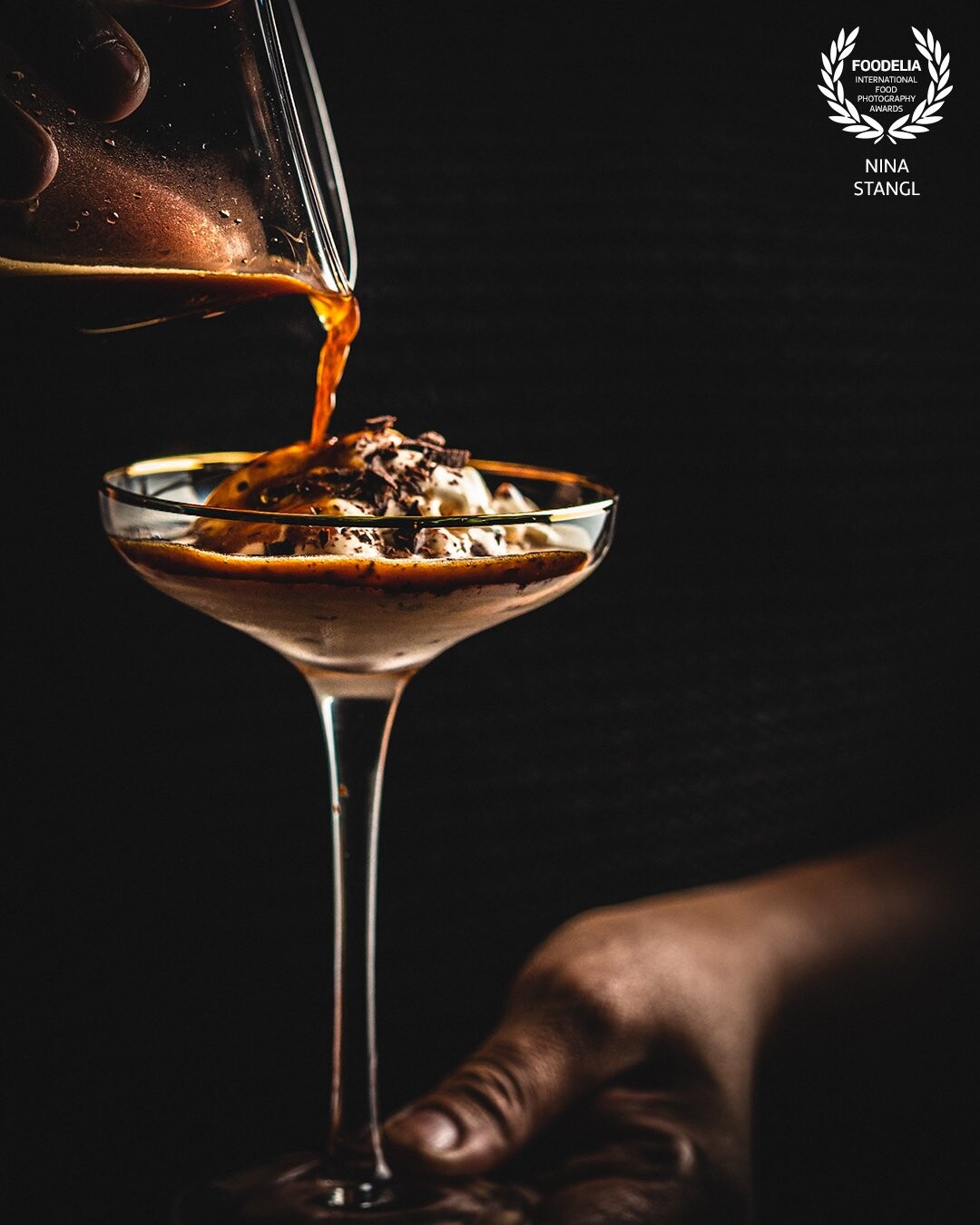 This is one of my favorite coffee desserts. It’s a delicious  affogato al caffe  . I  created a warm coffee colored mood and used negative space, my hands and the high cocktail glass as leading lines.