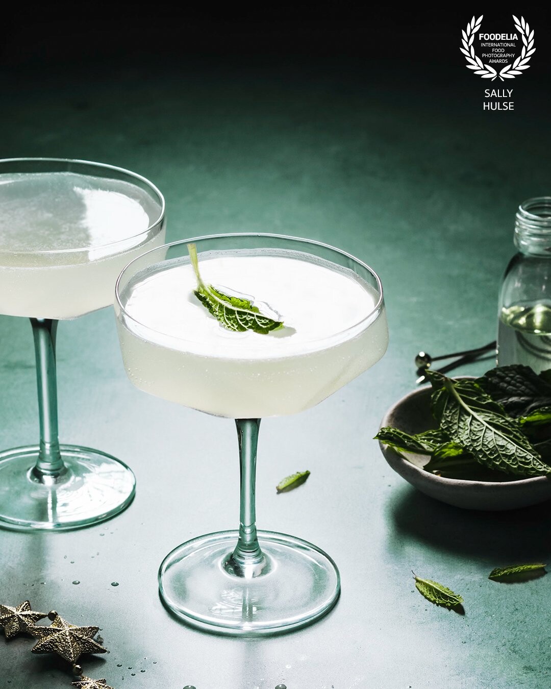 Christmas Mint Gimlets. <br />
I love dark and bright images with a whole lot of mood and drama, and I wanted to go for that here. I stuck with a monochromatic colour scheme and minimalistic composition to really let the drink shine.