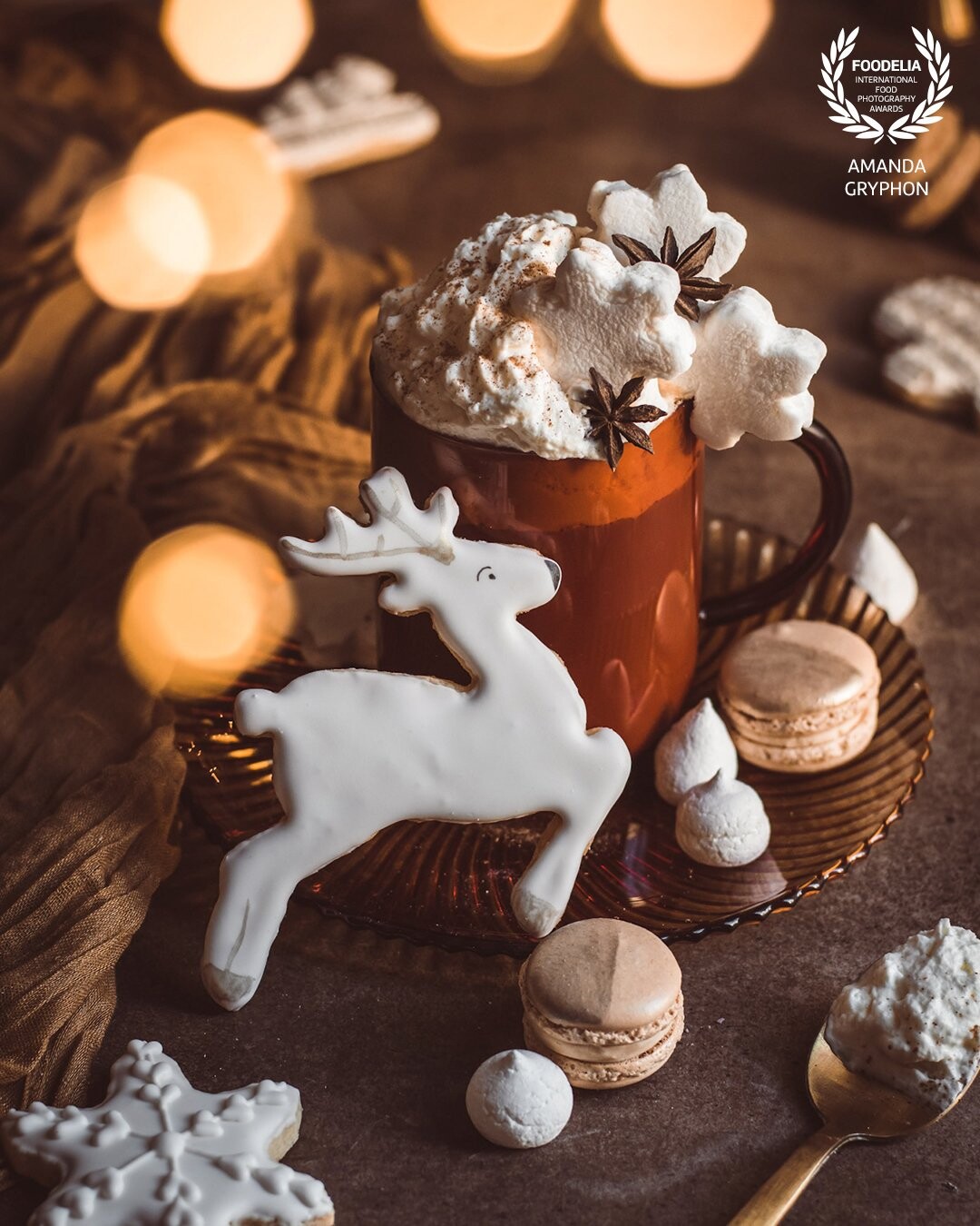 A cozy sugar cookie latte piled high with whipped cream and marshmallows called for a touch of festive bokeh, made possible by a thin thread of fairy lights held in the foreground.