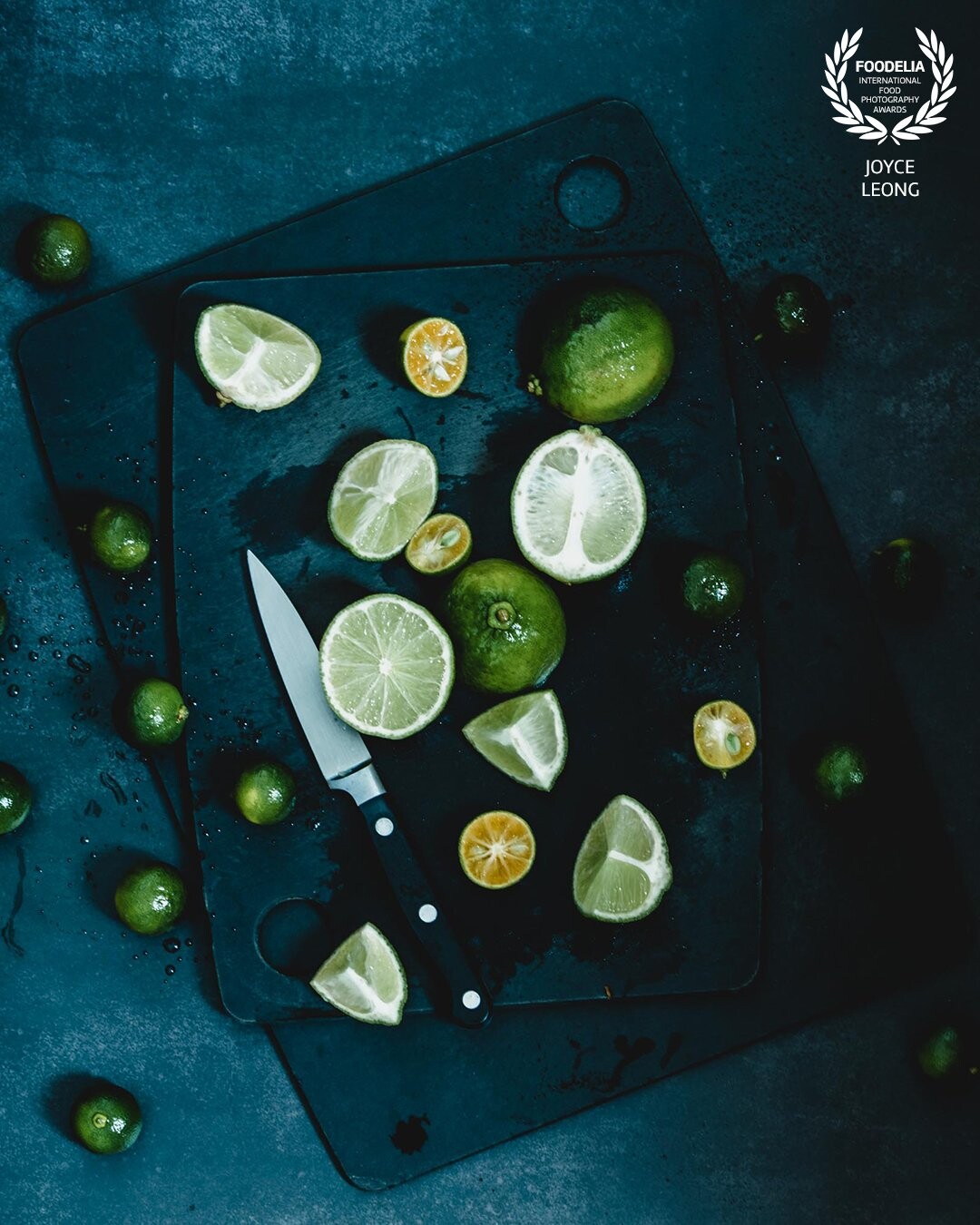 Fresh limes with water droplets coupled with a moody edit was the look I was going for. Used limes of various sizes and cut differently to make it more visually interesting.