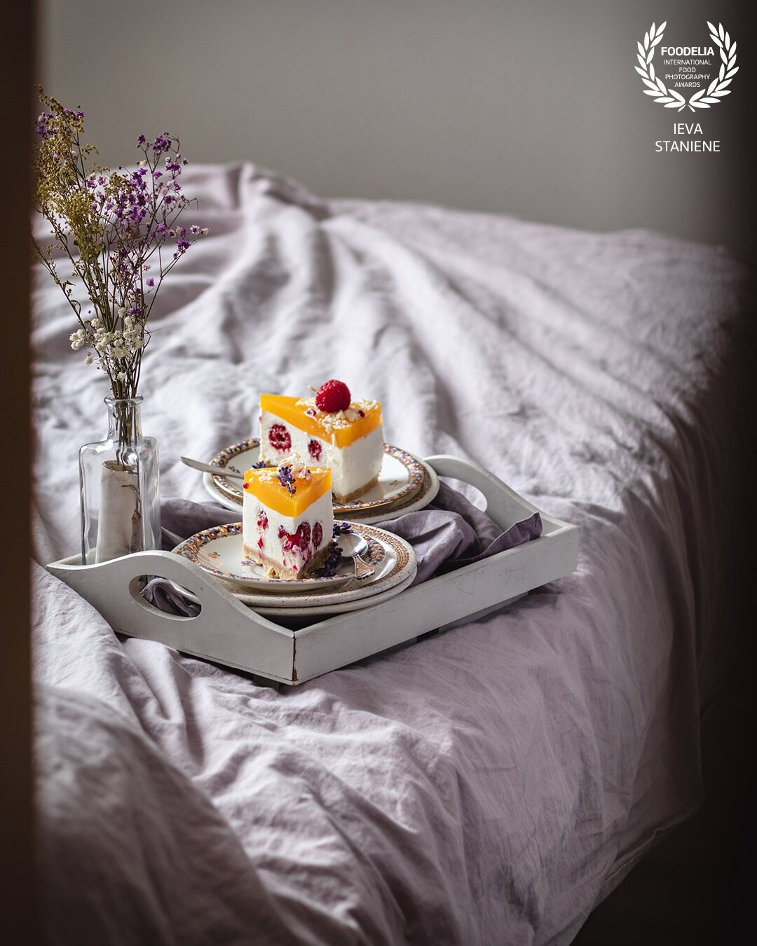 Who wouldn’t like to spend a lazy weekend morning or afternoon with a piece of tasty curd, white chocolate, raspberry and mandarin cake? <br />
<br />
I captured a tiny bit of door to frame and narrow the scene and make the subject pop.