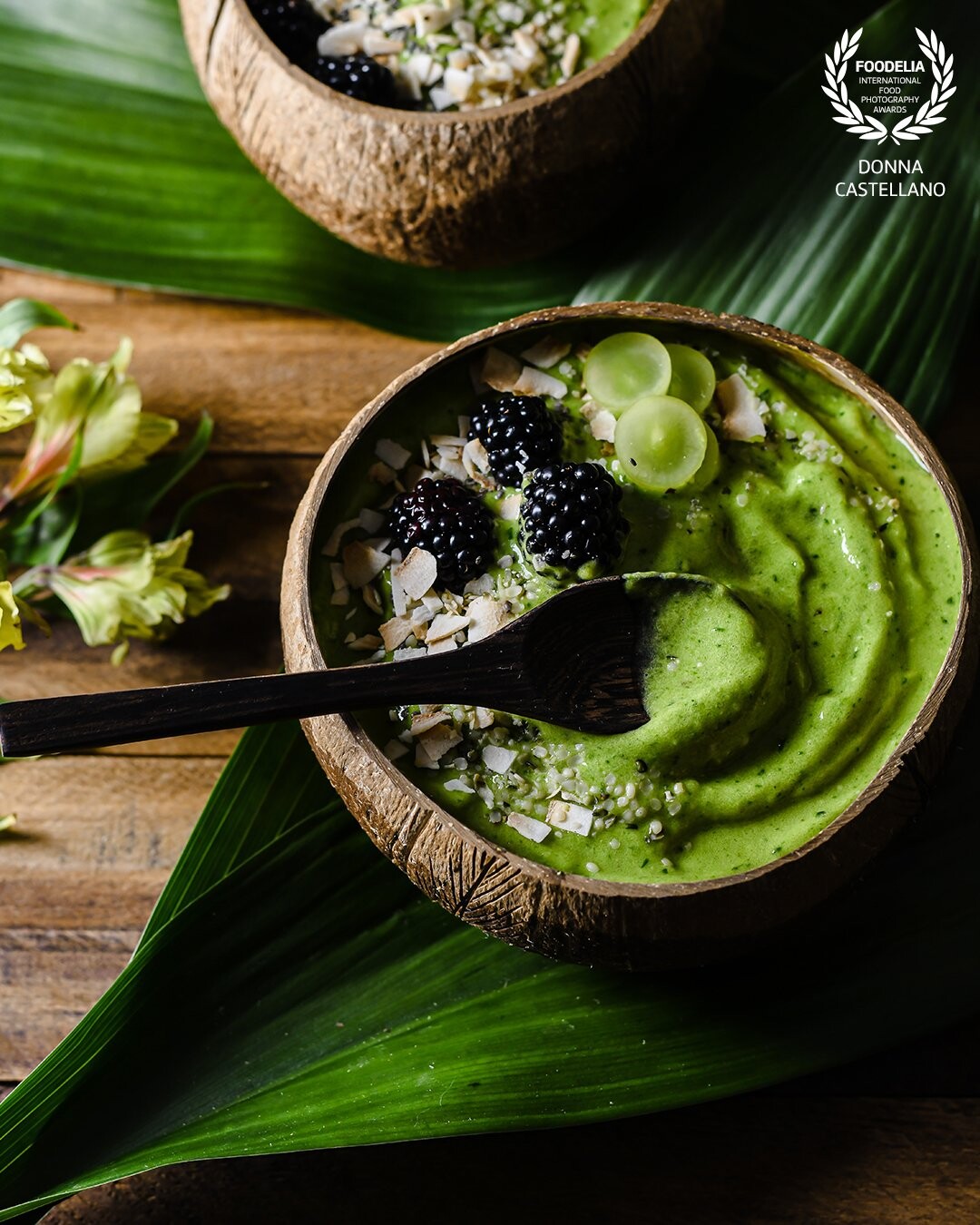 The perfect way to get your greens in is with this thick and creamy green smoothie bowl, made with the luscious tropical flavors of coconut, pineapple and banana and colorfully infused with spinach leaves for a delicious and nutritious treat!