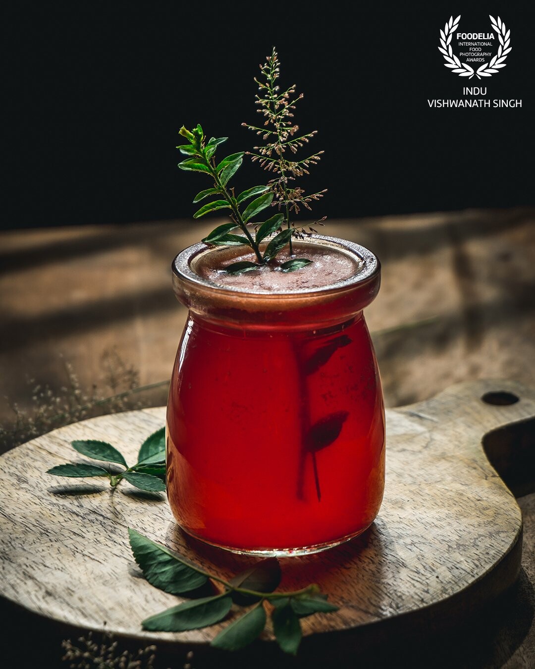 Hibiscus Tea shot. Play of shadows and highlights play a major role in shaping my photos. This was a simple setup and was created to make an impact.