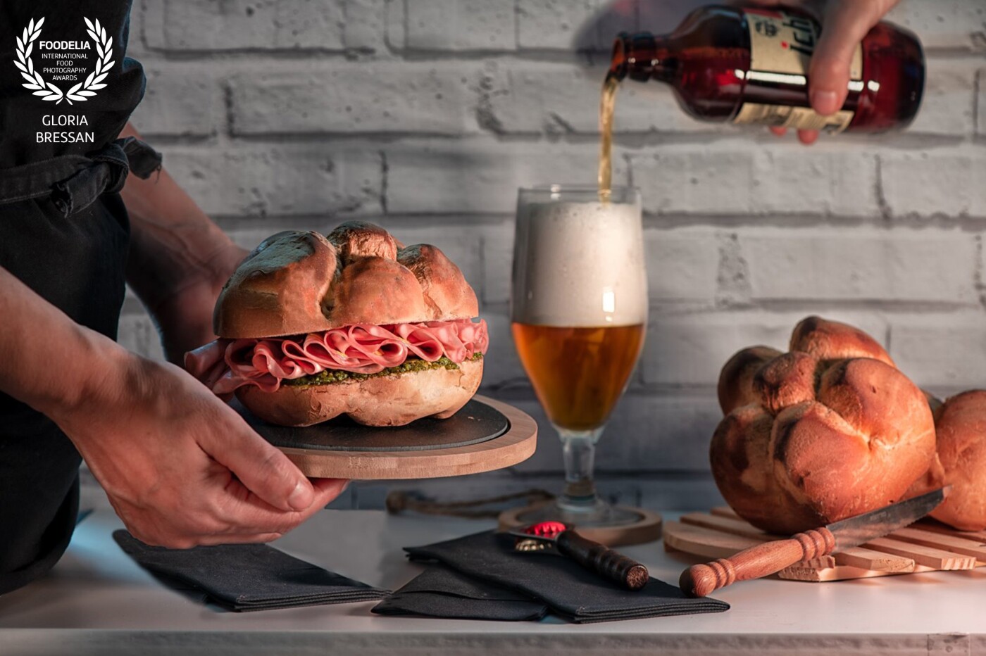 It is a long time  that I want to make this picture with my typical and favourite Italian bread with mortadella and Pesto. During the summer in Italy a "micchetta con mortadella" and a beer is a must! I Use only a pocket soft light in the right and that's it!