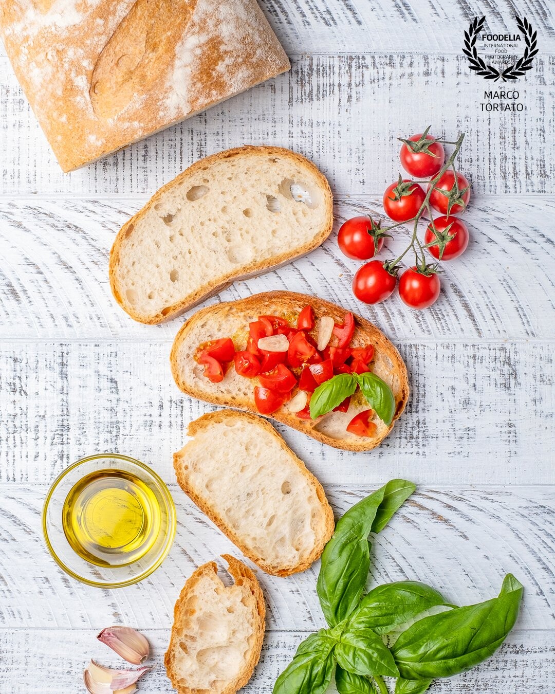 Italy and the Mediterranean colors and flavors in one shot. Basel, Extra Virgin Olive Oil, little tomatoes, garlic and bread. <br />
Bruschetta! <br />
<br />
www.marcotortato.it