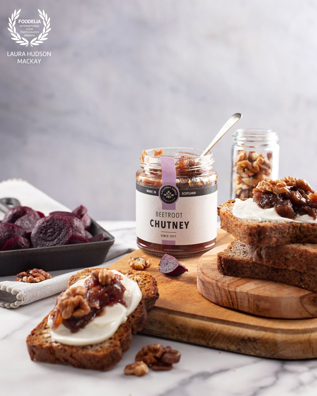 I have the pleasure to style and shoot for award winning Preserves and Condiments Producer, Galloway Lodge. I chose muted colour for the surface, backdrop and fabrics for this product, which makes the beetroot chutney POP! It’s delicious by the way!